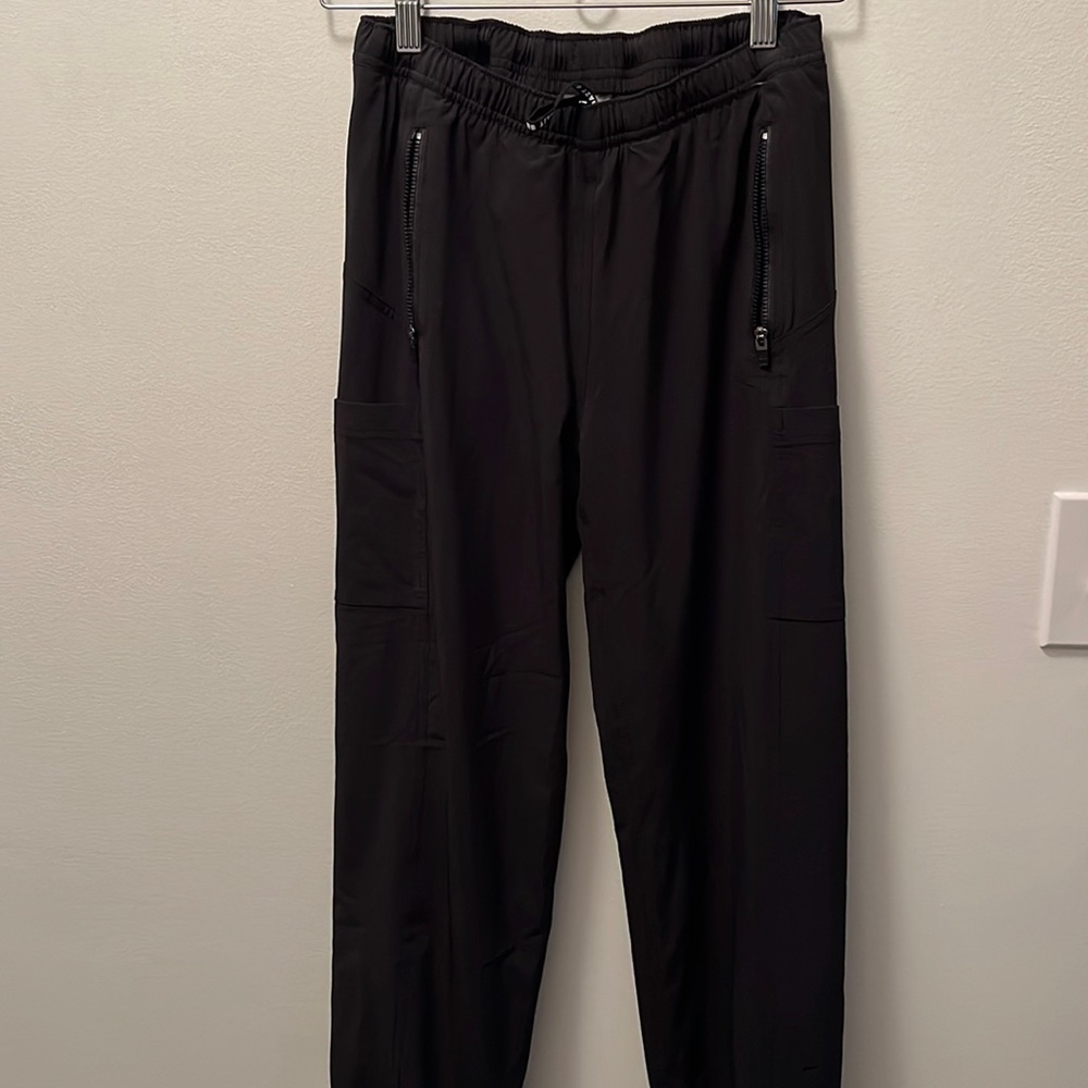 Athleta Girl fleece-lined nylon pants.